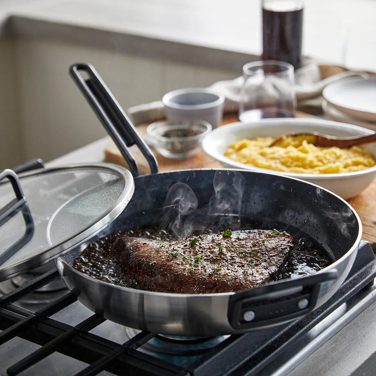 Stanley Tucci™ Stainless Steel Ceramic Nonstick 4-Piece Frypan Set with The Tucci Cookbook | Black Handles